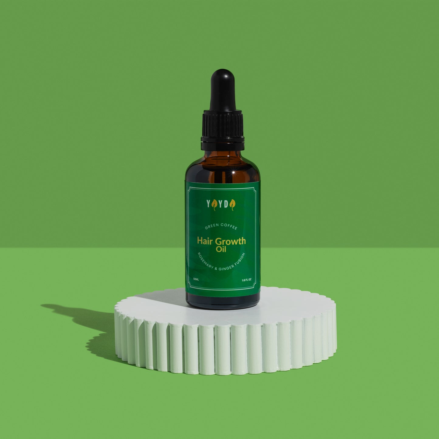 Amber bottle in green studio background