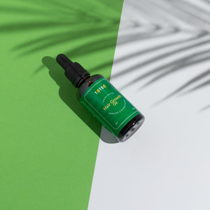 Hair oil bottle on side 