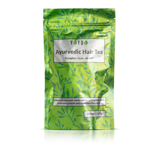 Green hair tea bag in studio background